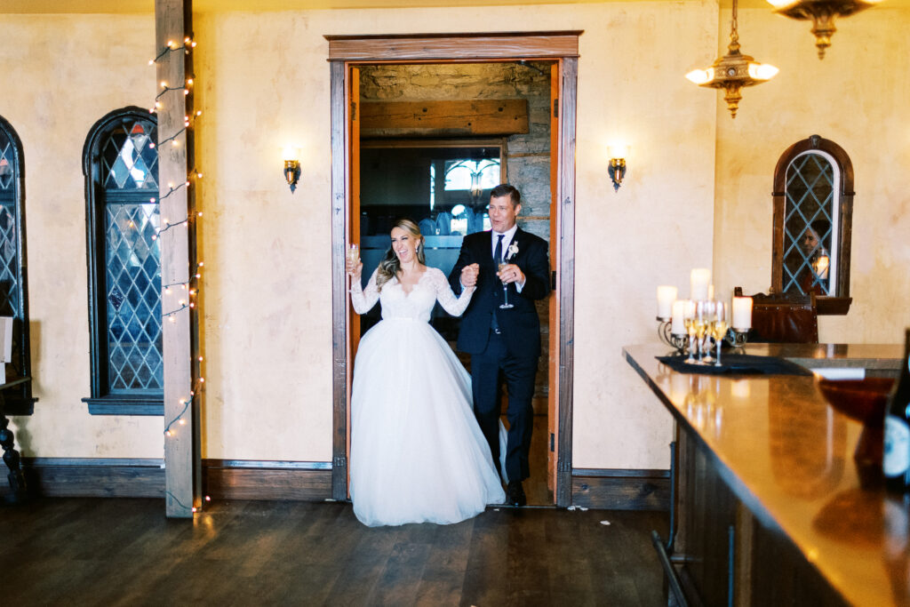 Grand entrance of Bride and Groom at Aster Weddings & Events in Minneapolis. Photographed by Toly Dzyuba Photography.