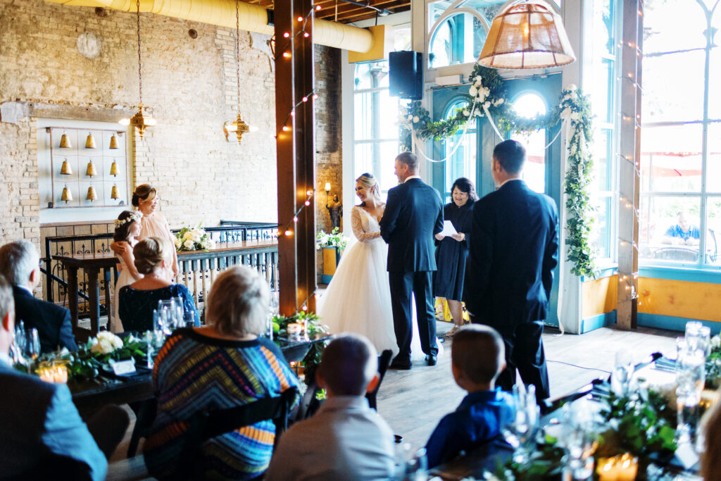 Bride is laughing with joy on her ceremony.