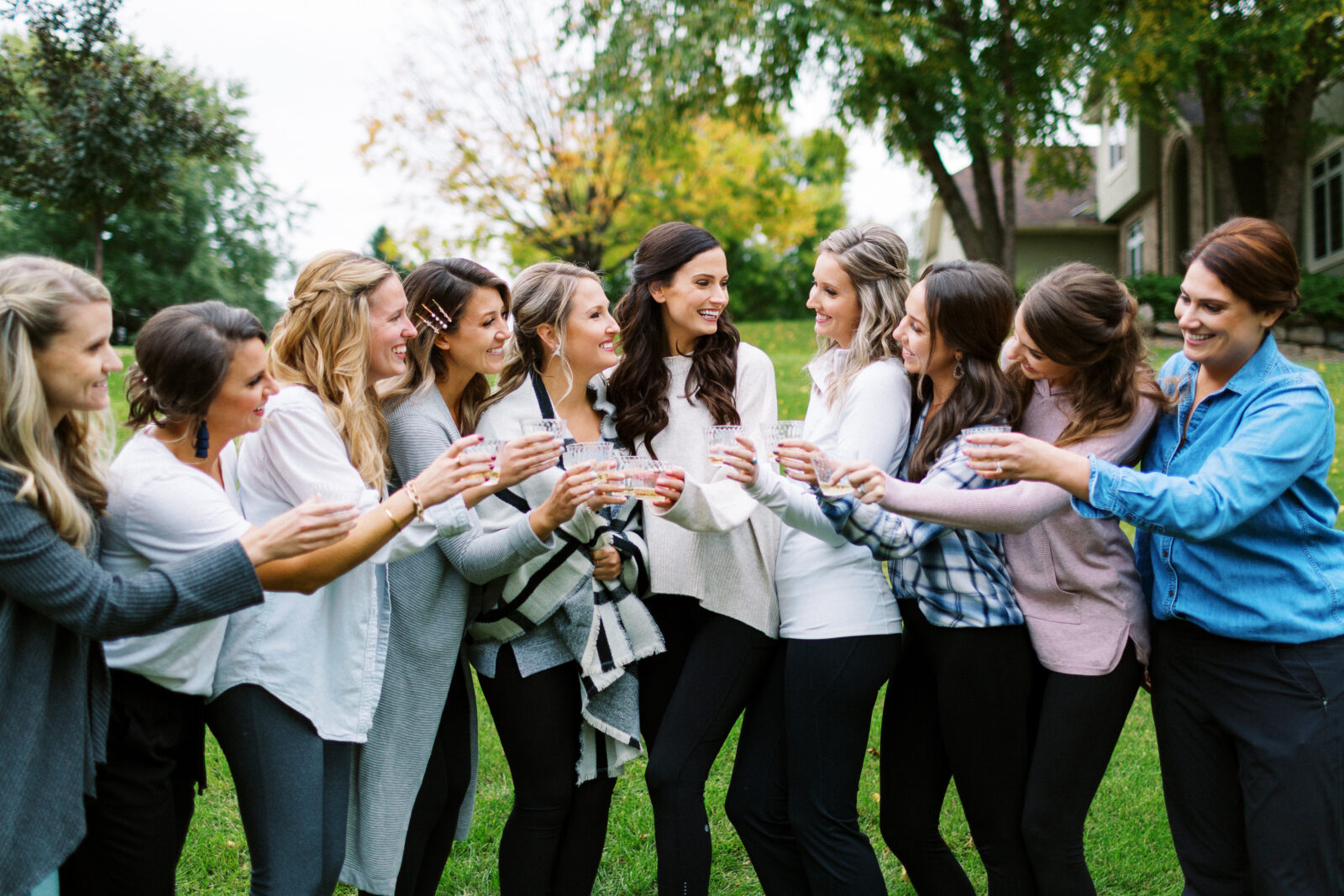 Bridesquad toasting with celebration and smiles at Bearpath Golf and Country club.