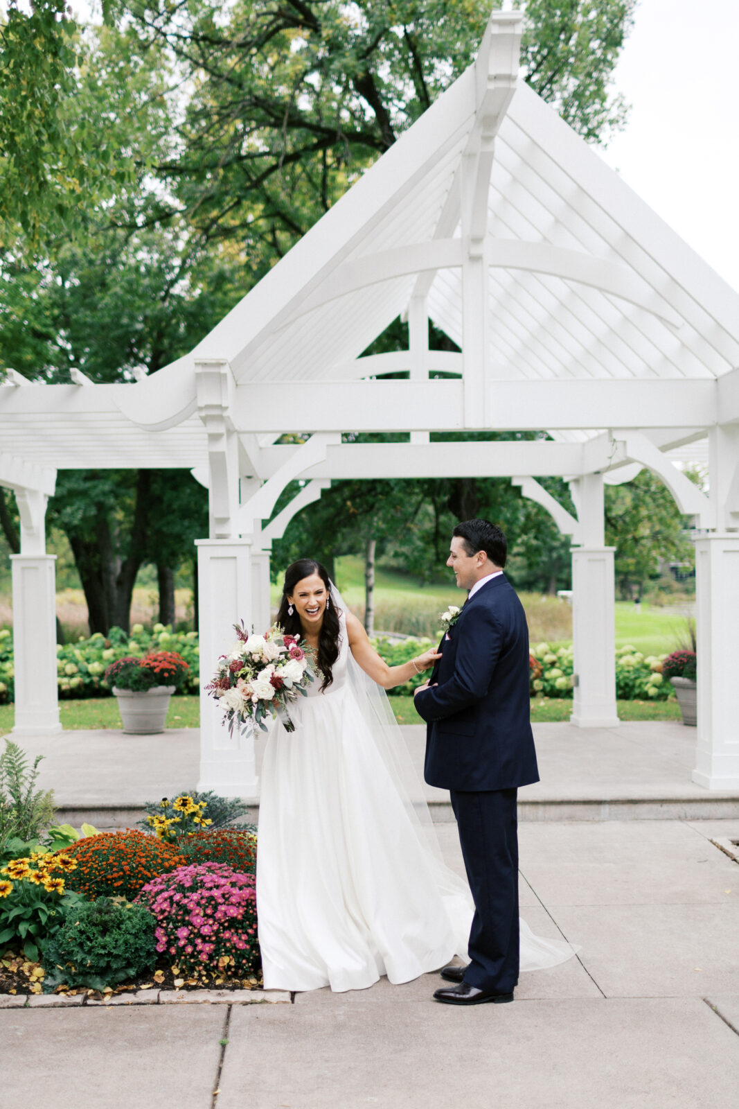 Bride is in  the moment of laughter.