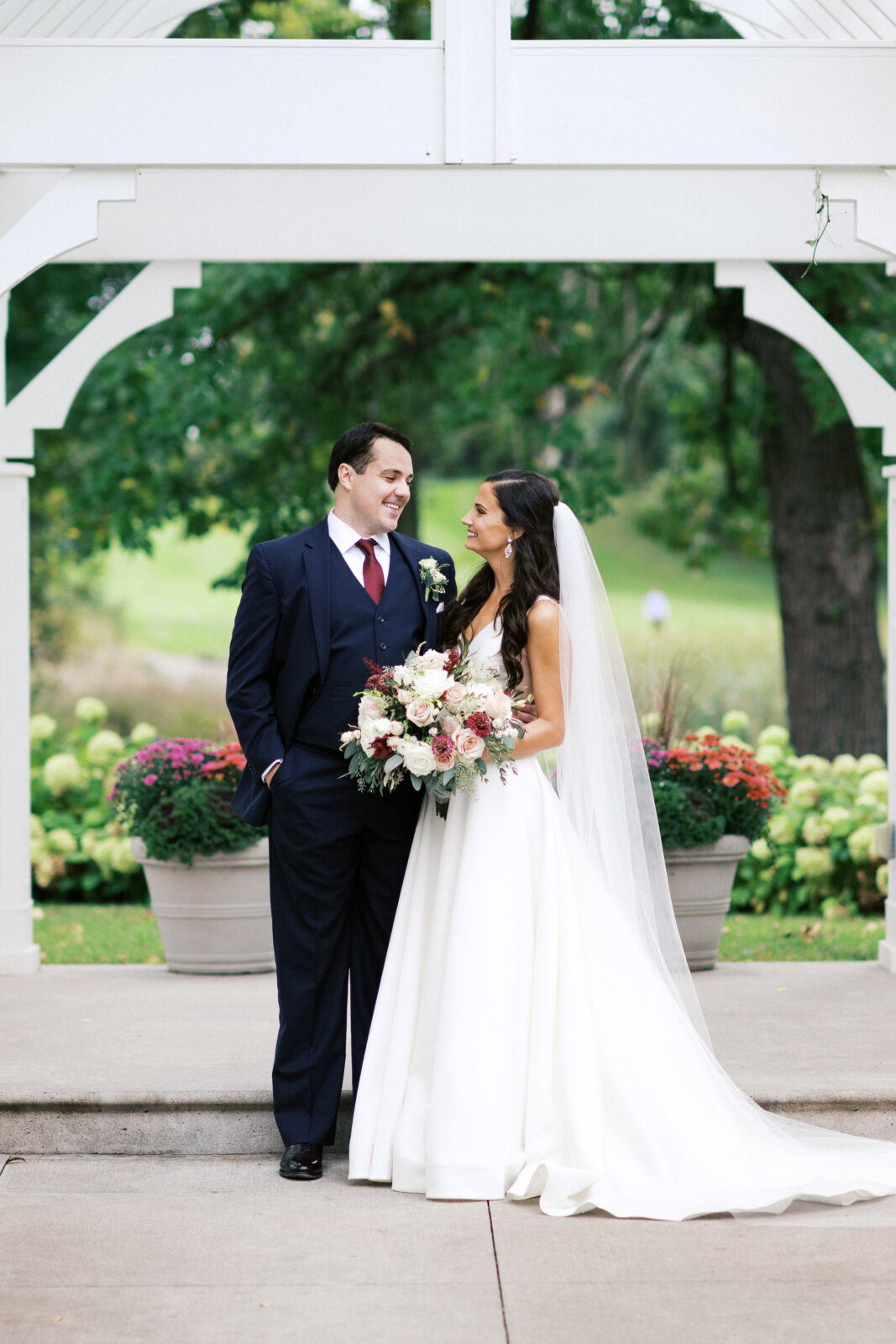 Bride and groom looking at each other in awe. 