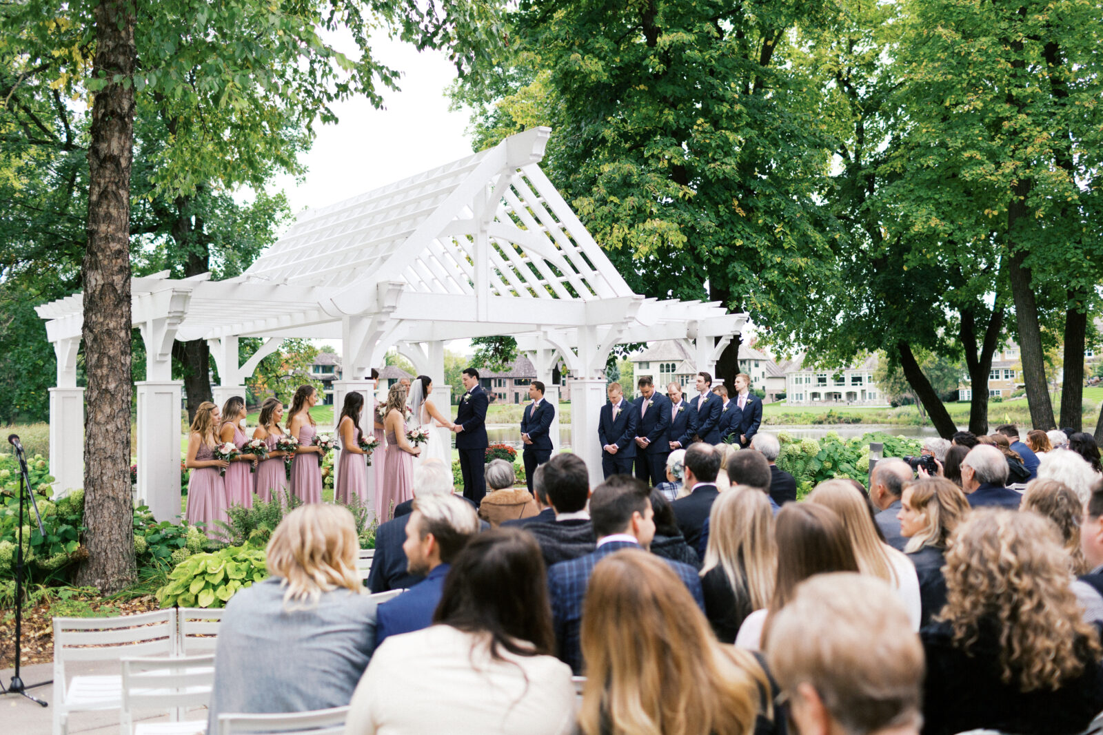 Minneapolis wedding photographer is capturing the wedding ceremony wide angle view