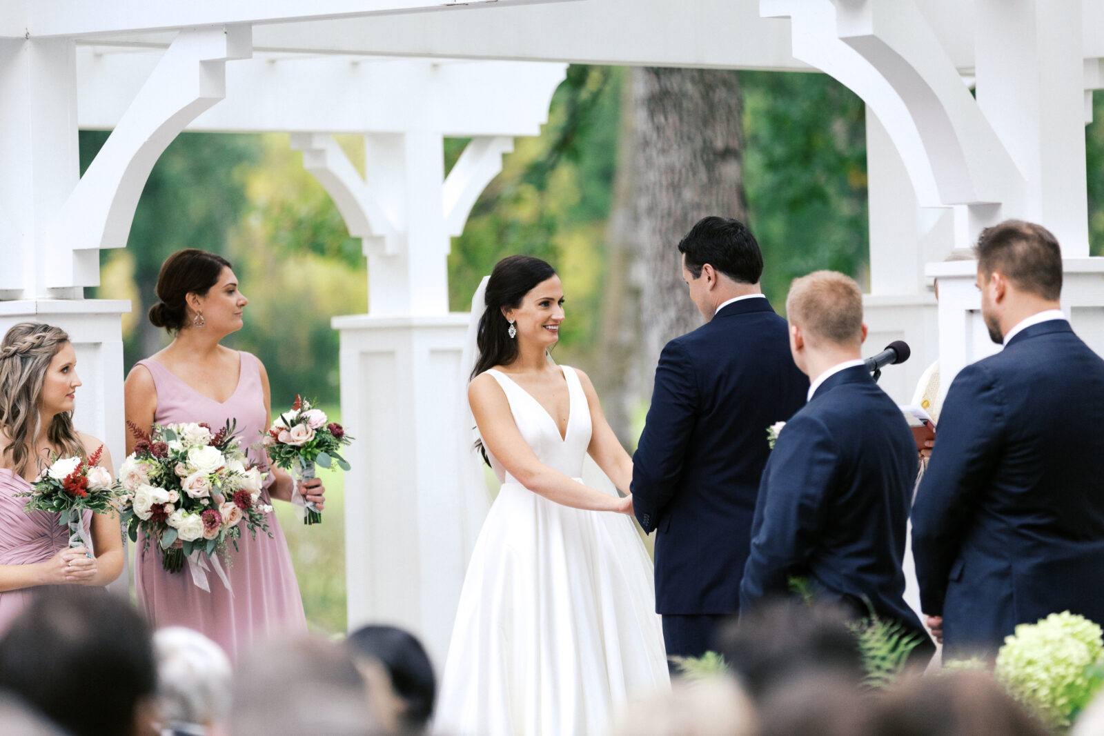 Bride is smiling on her ceremony