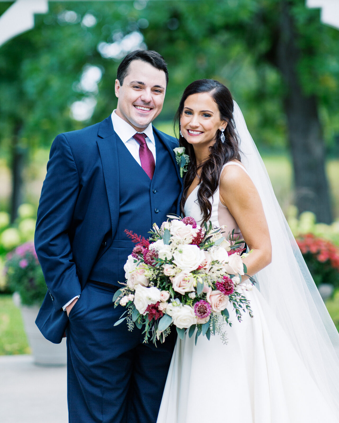 Minnesota wedding photographer is capturing the portrait of the bride and the groom.