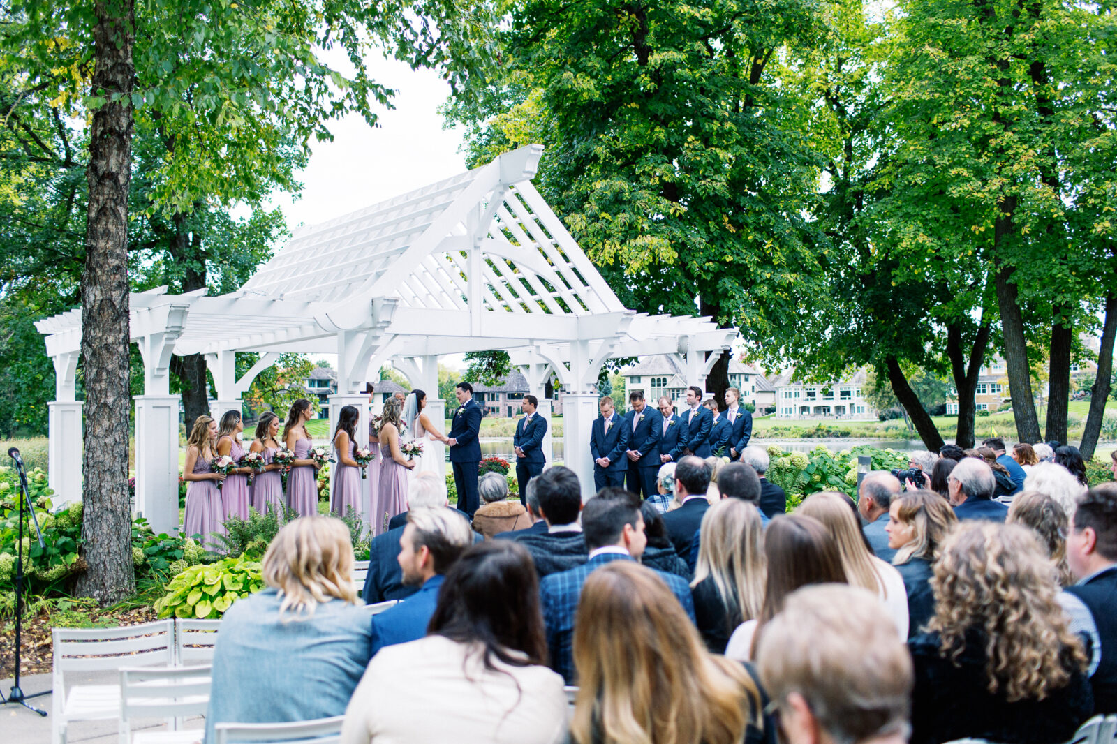 Minneapolis wedding photographer is capturing the wedding ceremony wide angle view