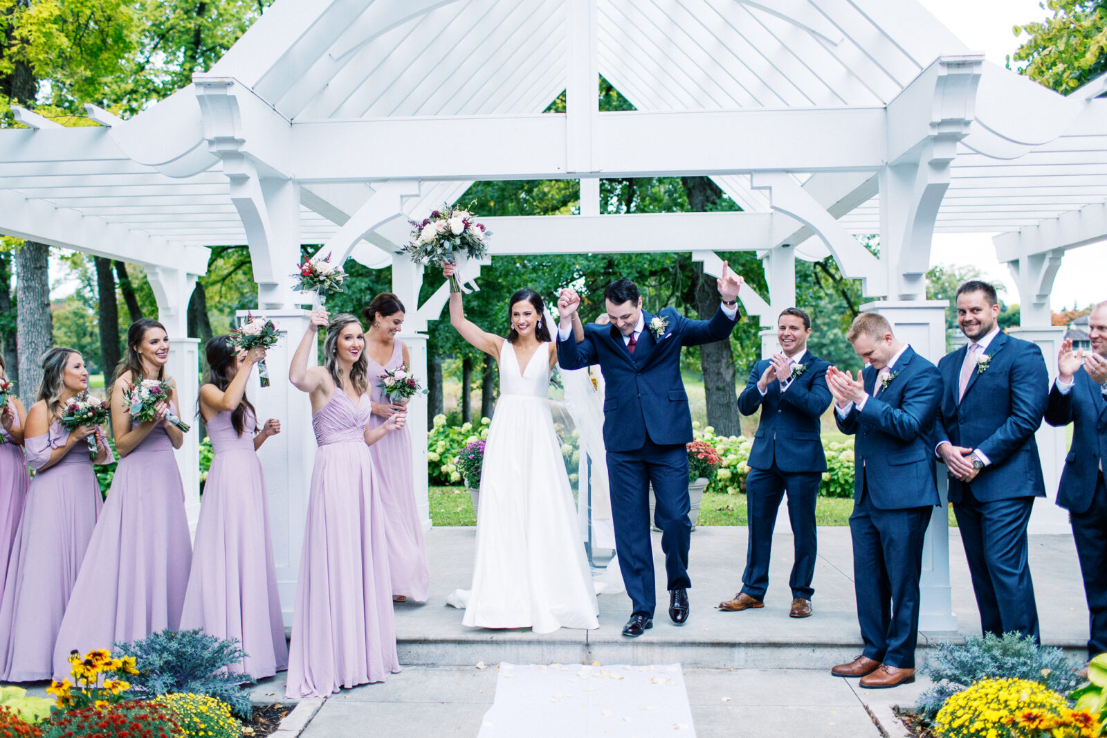 Minneapolis wedding photographer photographing the grand exit