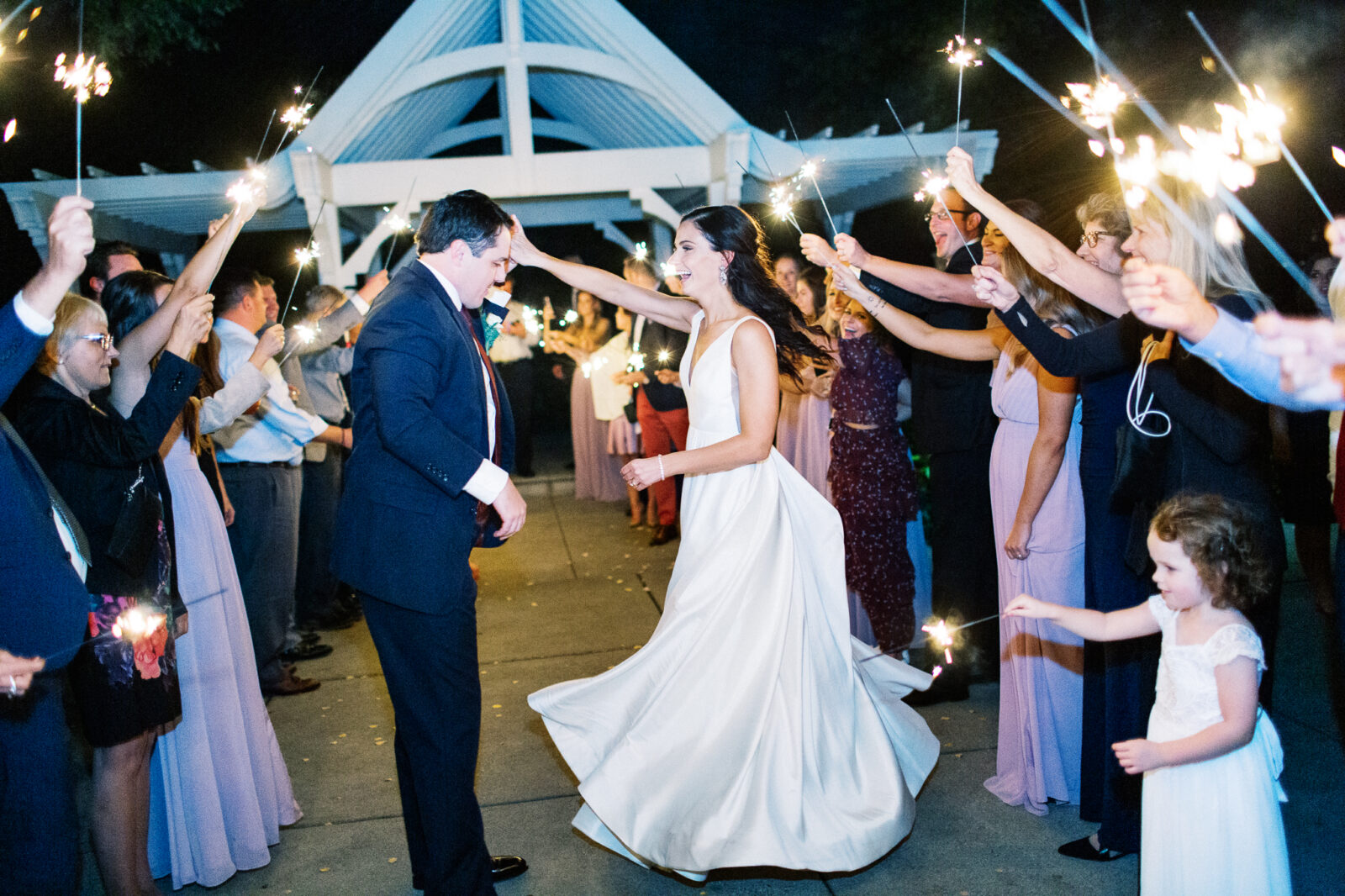 Magical Sparklers Parade with bride and groom 