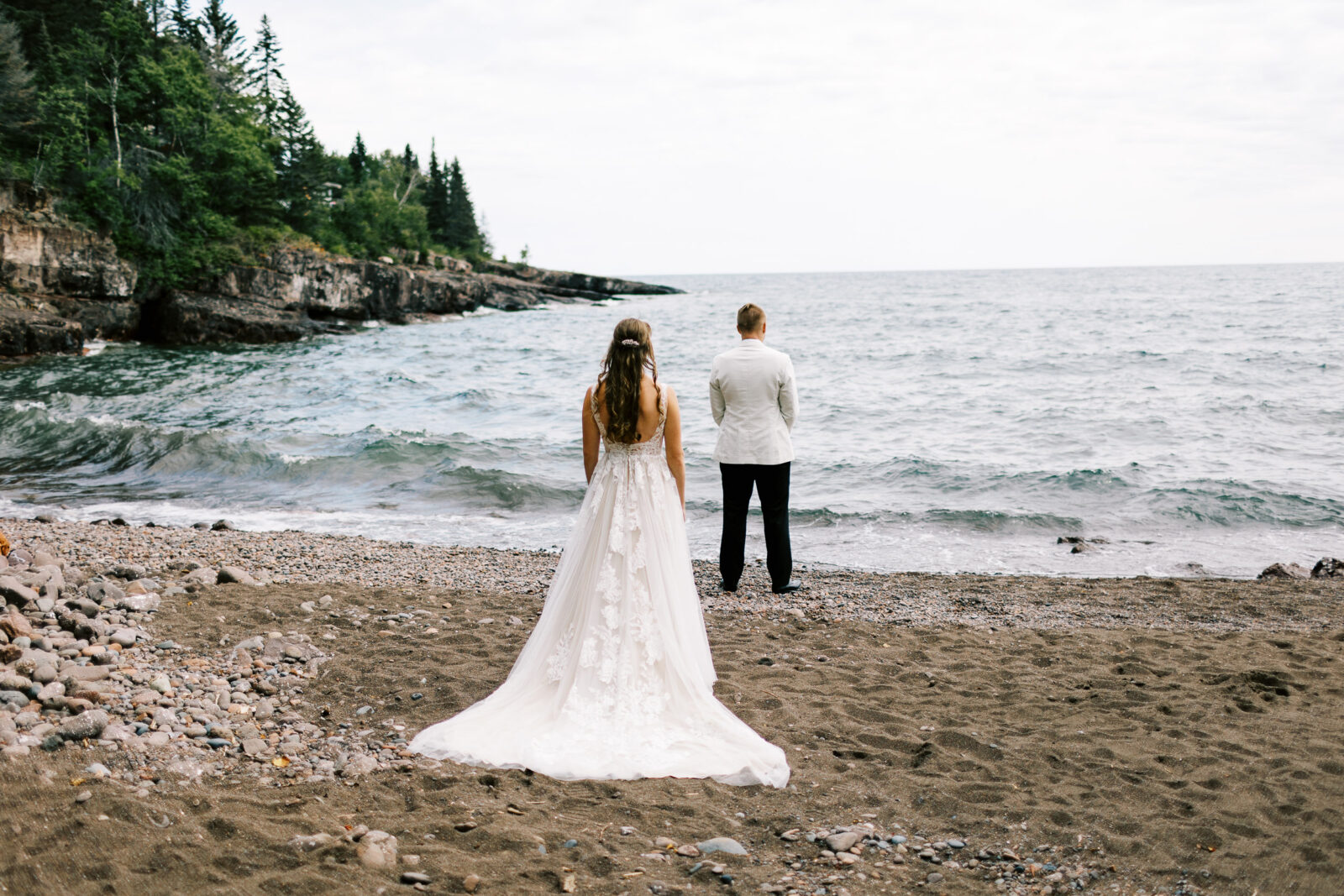 First look for bride and groom on the beach of North Shore.