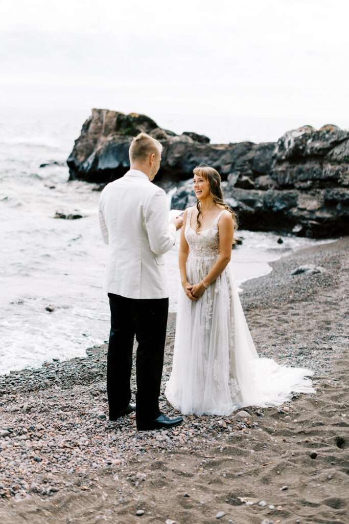 Groom reading his vows 