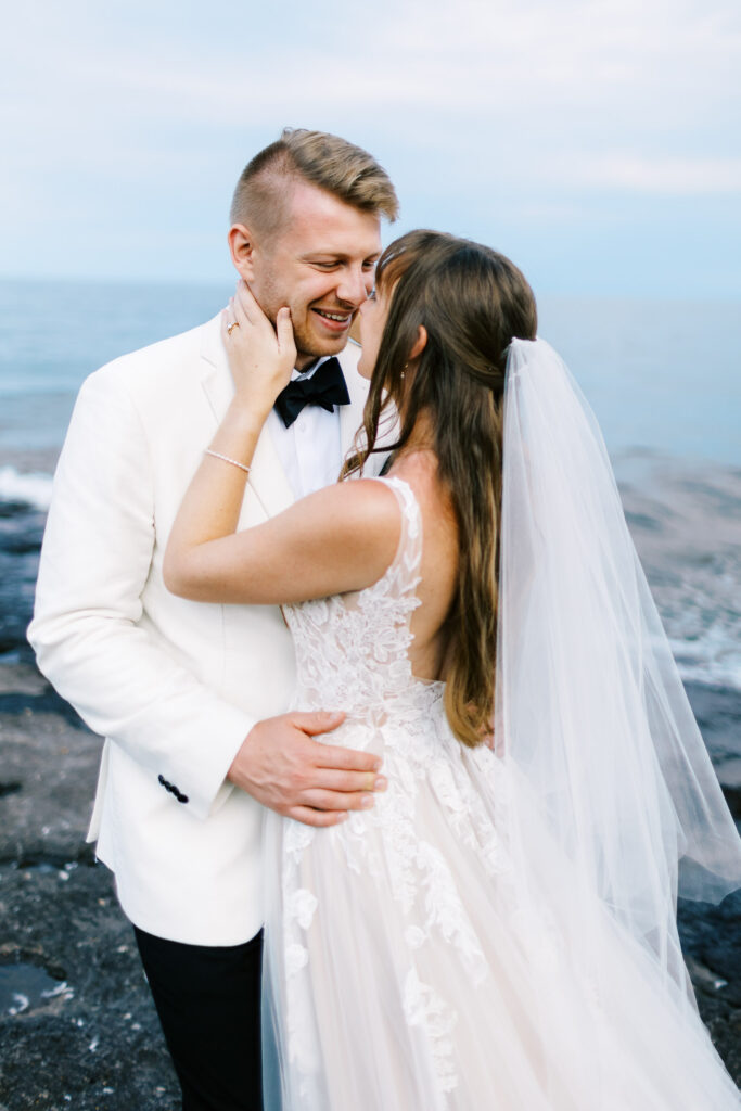 Newlyweds looking at each other with joy on North Shore