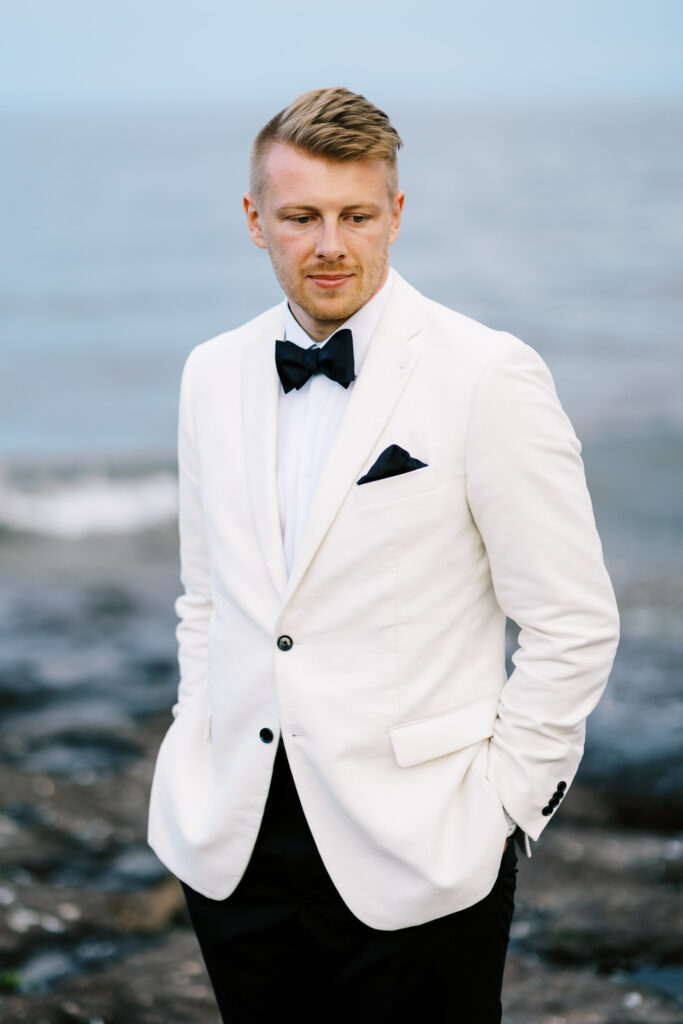 portrait of the groom at Bluefin Bay Family Resort