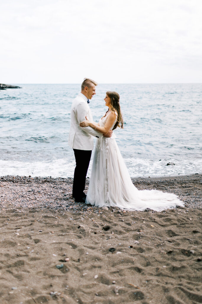 Bride and groom looking at each other. 