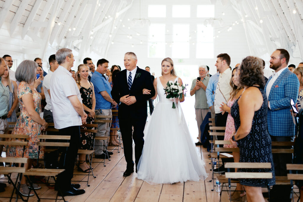 Bride walking down the aisle. At Ivory North.