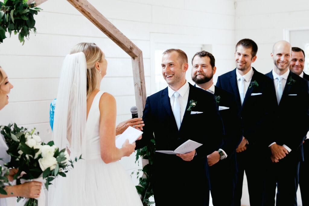 Groom pronounces his vows on his wedding day. By Toly Dzyuba Photography.