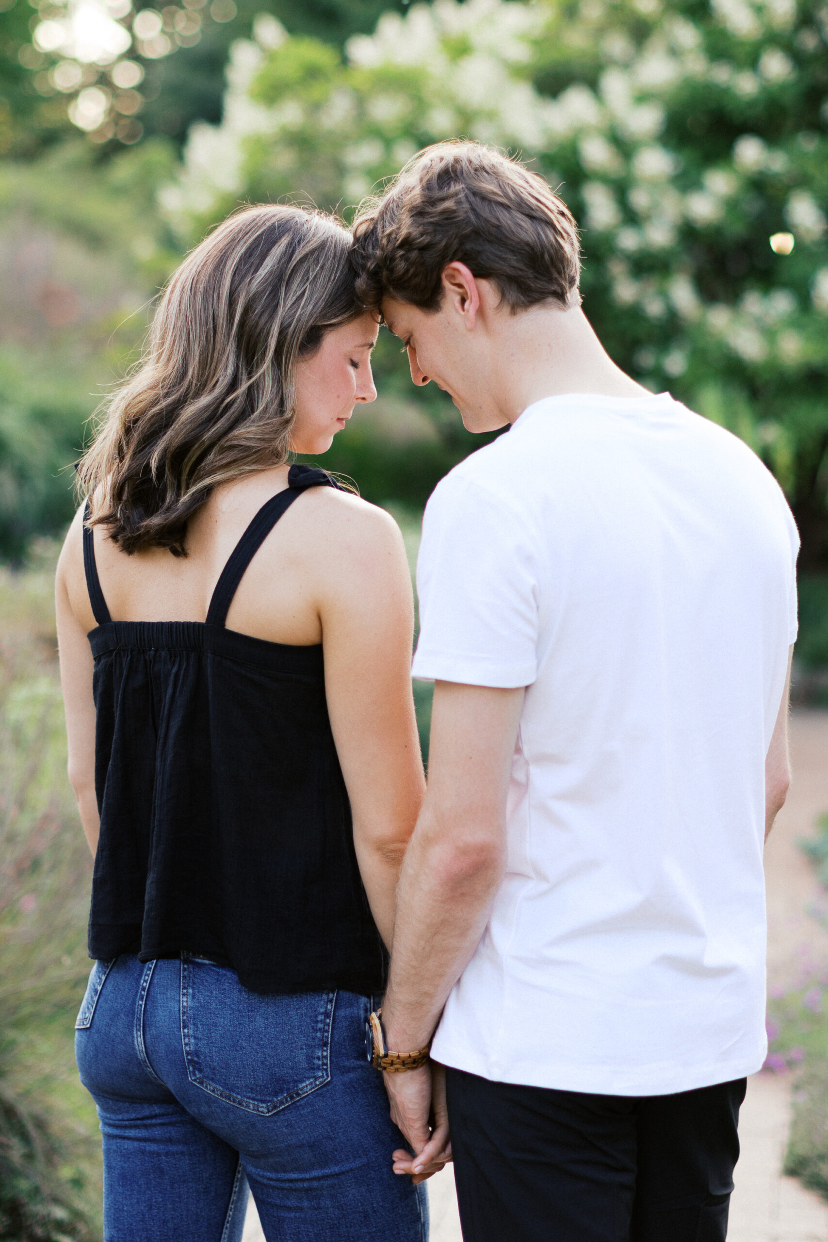 A tender moment as the couple gently touches heads, sharing a quiet connection and deep affection. Captured by Toly Dzyuba Photography.