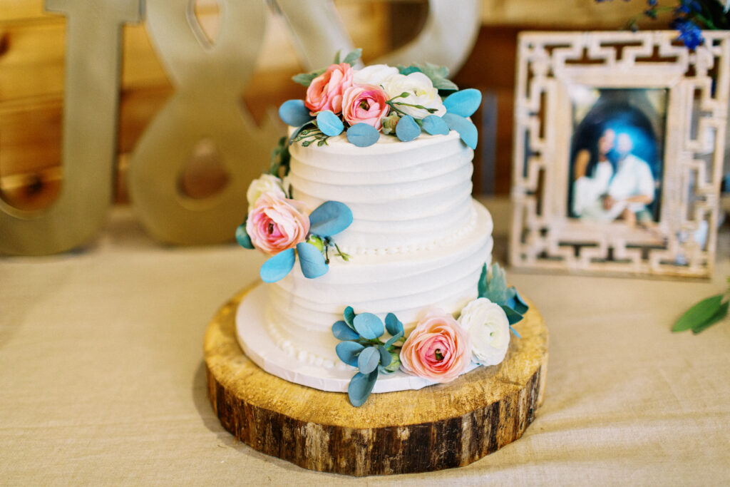 Wedding cake with beautiful roses on it.