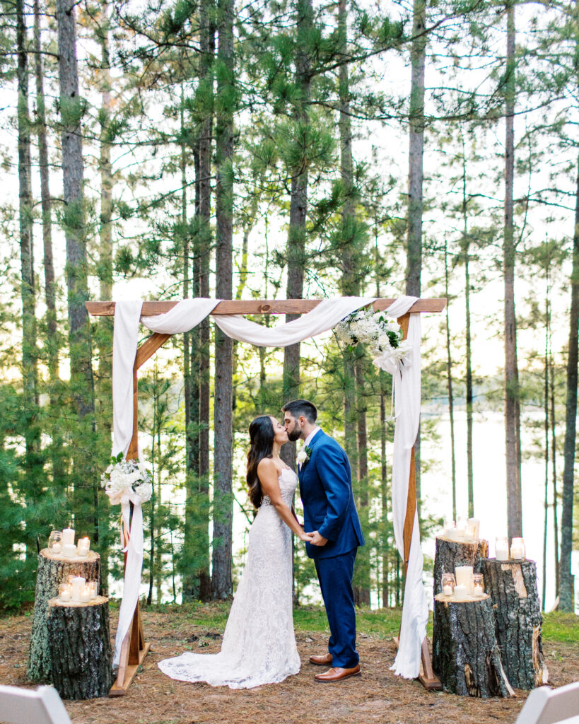 Bride and groom kiss as they pronounced husband and wife, a heartfelt Elopement in Webster, WI. Captured by Minnesota Wedding Photographer.