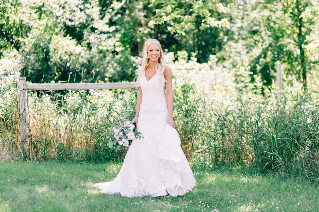 bride looking away as she poses for a photo.