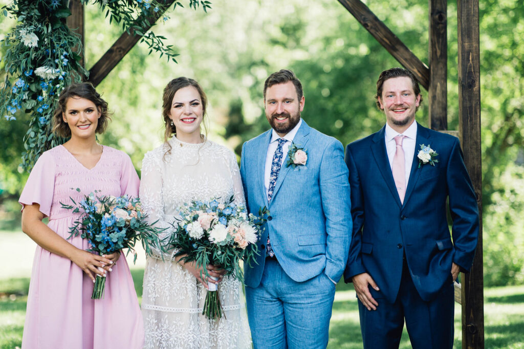 Wedding party photo at their summer backyard wedding in Minneapolis.