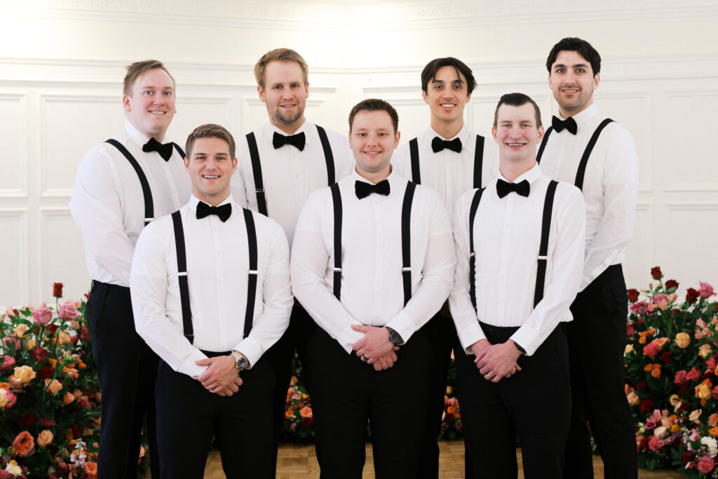 Groomsmen posing in style for a luxury wedding portraits at St. Paul College club.
