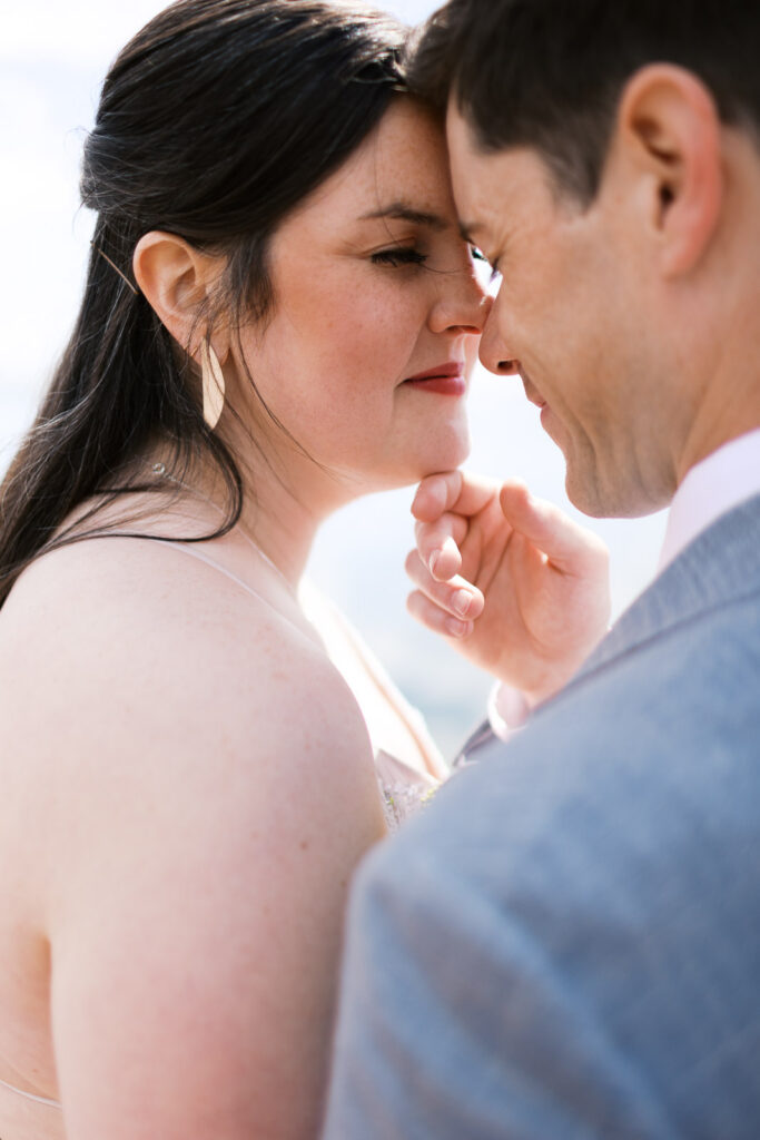 Intimate moment with bride and groom at The Mayhem Inn, captured by Grand Marais wedding photographer.