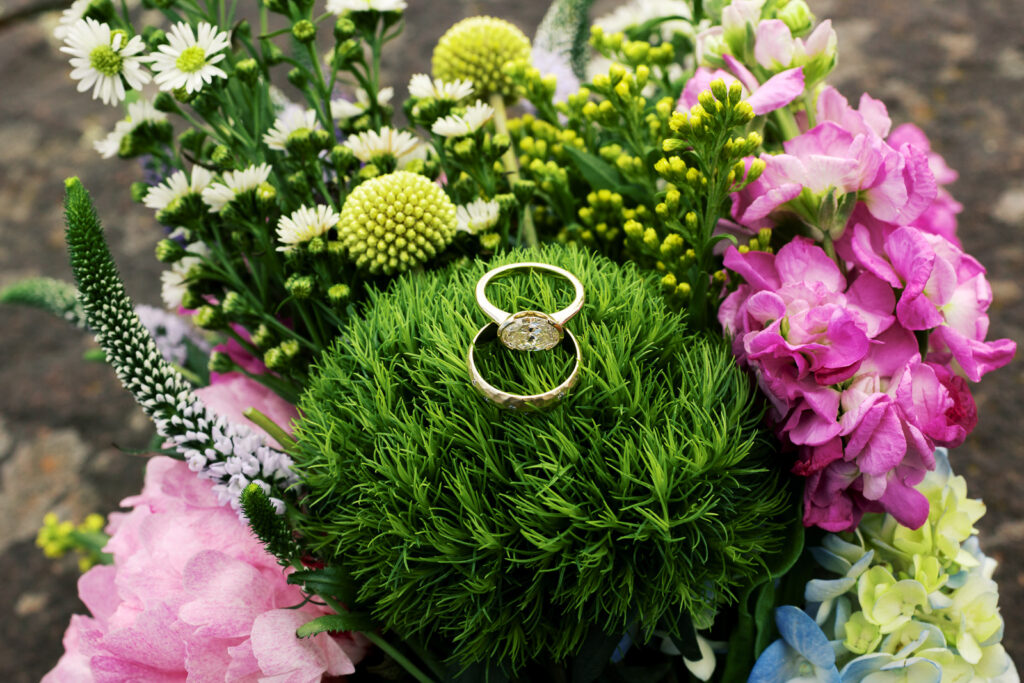 Wedding rings during an intimate North Shore wedding at The Mayhew Inn.